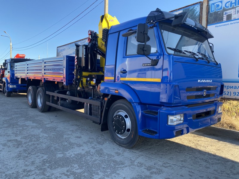 Автомобиль бортовой 438210 на шасси Камаз 65117-23010-50 с КМУ Hyva Crane HВ 150 E2