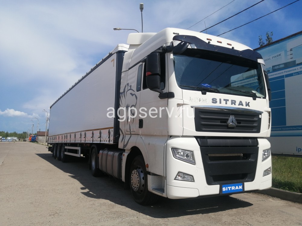 Автомобиль-тягач SITRAK C7H 4х2 + Полуприцеп шторный UAT SCFG 9226.01